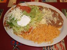 Enchilada with Green Sauce and Sour Cream